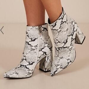 Snakeskin pointed toe ankle boots